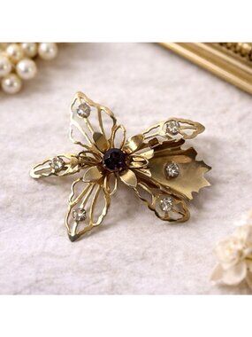 Vintage Gold Tone Filigree Flower Brooch Rhinestone & Purple Gem Accent Elegant